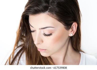 Girl With Extended Silk Eyelashes And Eyes Closed In A Beauty Studio, Close Up