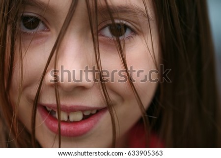 Similar – Happy girl with food on her mouth