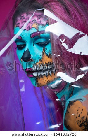 Girl with face art skull
