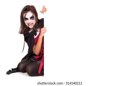 Girl With Face-paint And Halloween Vampire Costume Over A White Board