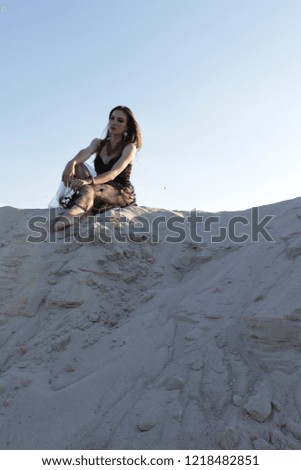 Similar – Image, Stock Photo Tattooed woman in front of a painted wall