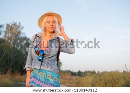 Girl in fashion summer accessories and jeans outfit in cacti location. Travel summer mood