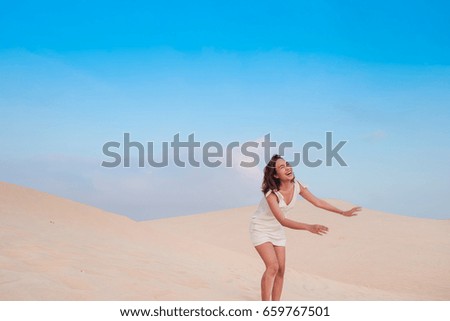 Similar – Image, Stock Photo Tattooed woman in front of a painted wall