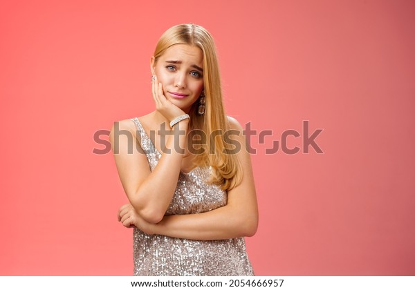 Girl feeling pity empathy friend telling sad story.\
Attractive stylish glamour girl feel boredom dating uninteresting\
guy lean head palm smirking frowning intense look annoyed, wanna\
escape home