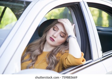 The Girl Fell Asleep At The Wheel Of The Car