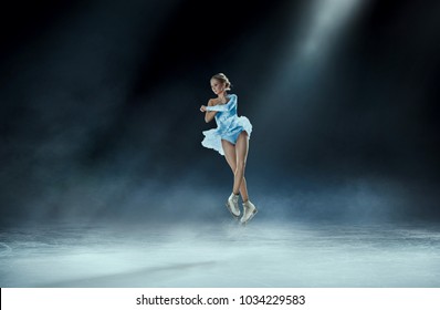 Girl Figure Skating At Ice Arena