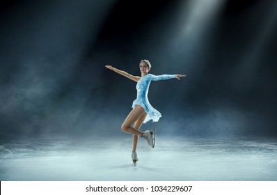 Girl Figure Skating At Ice Arena