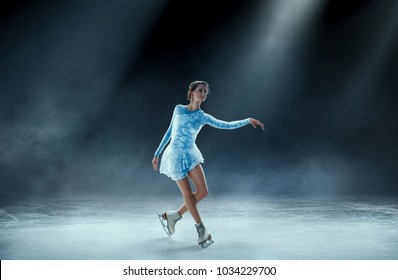 Girl Figure Skating At Ice Arena