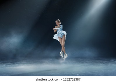 Girl Figure Skating At Ice Arena