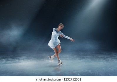 Girl Figure Skating At Ice Arena