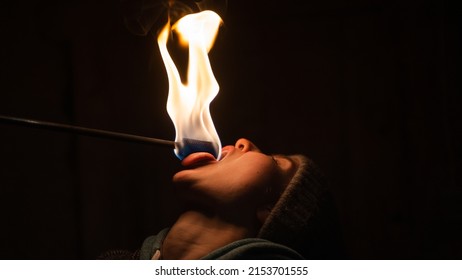 Girl Fire Eating - Touching Flame To Tongue