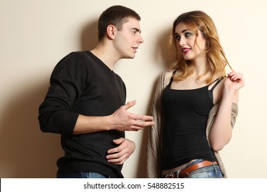 Girl Flirting With A Guy. The Concept Of Relationship.