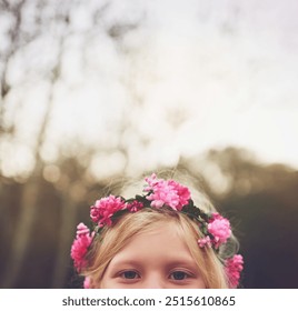 Girl, flower crown and eyes for fun, playful expression and peekaboo games outside nature. Child, kid and youth in hide and seek activity, backyard dress up and fairy princess costume for birthday - Powered by Shutterstock