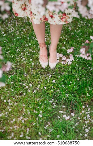 Similar – Feet of a woman wearing sandals