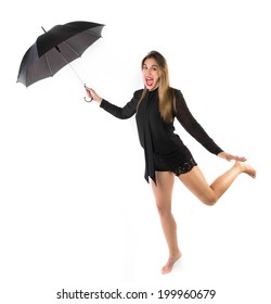 Girl flying with a umbrella