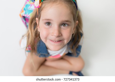 A Girl With Freckles Is Excited And Nervous For Her First Day Of School.
