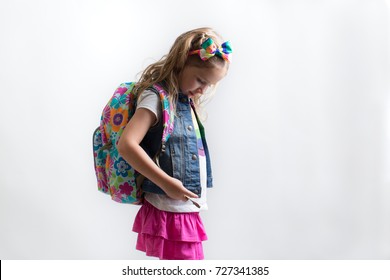 A Girl With Freckles Is Excited And Nervous For Her First Day Of School.
