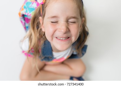 A Girl With Freckles Is Excited And Nervous For Her First Day Of School.
