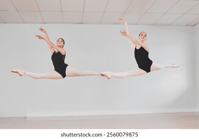 Girl, friends and ballet dancer with jump for performance, elegance or practice together in studio. Young female person, ballerina or partners in air or pose for choreography routine, lesson or class - Powered by Shutterstock