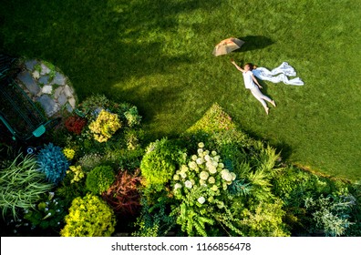 Girl In The Garden With An Umbrella, Top View