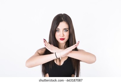 Girl Gesturing X With Arms Crossed, Light Background