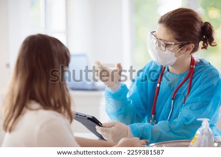 Girl getting vaccine. HPV vaccination for young girls. Doctor giving teen kid patient shot. Immunization program for adolescents and children. Health care. Teenager at pediatrician.