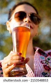 A Girl With A Glass Of Craft Beer. Summer. Drinks.