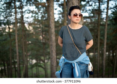Girl with glasses posing