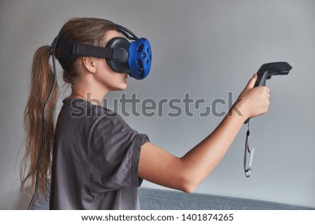 The girl in the glasses of virtual reality.