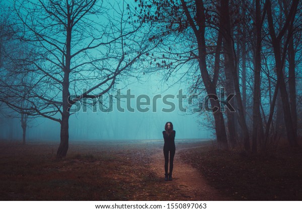 Girl Goes On Road Mysterious Forest Stock Photo Edit Now