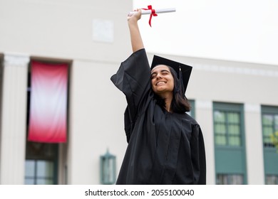 Girl graduating high school, celebrating academic achievement