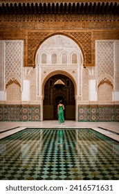 Girl in green dress posing in Morocco