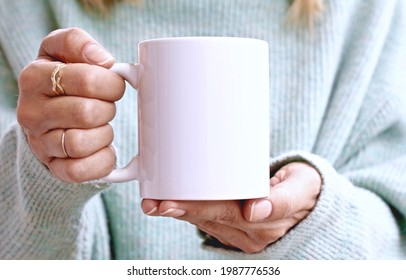 Girl In Green Sweater Holding Blank White Coffee Mug , White Ceramic 11 Oz Mug Mock Up
