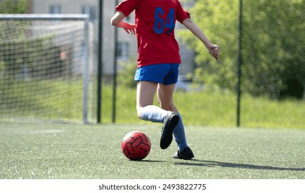 Girl Guides Ball Between Flip Cups At Football Practice, Close-Up View From Behind - Powered by Shutterstock