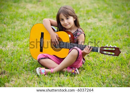 Similar – Image, Stock Photo Girl with a guitar in the green grass