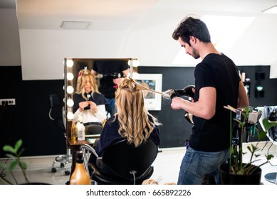 Girl At Hair Saloon With Young Male Hairdresser