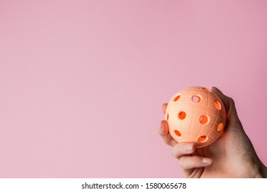 Girl Hand Holding Floorball Ball