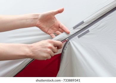 Girl Hand Unzip The Entry Of Camping Tent On Rainfly