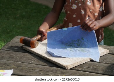 Girl Hands With Hammer And Cotton Textile. Creative Workshop With Natural Materials. Old Japanese Printing Technology 