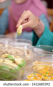 Girl Hands Holding Kuih Raya  During Eid-fitr.