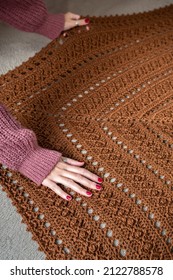 Girl Hands Stretching A Crochet Handmade Shawl