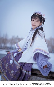 A Girl In Hanfu In The Snow