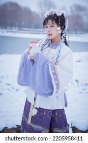 A Girl In Hanfu In The Snow