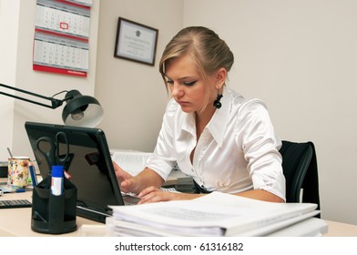 Girl hard works at office