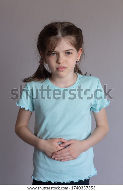 Girl Has Stomachache Stomach Cramps Little Stock Photo 1740357353 ...