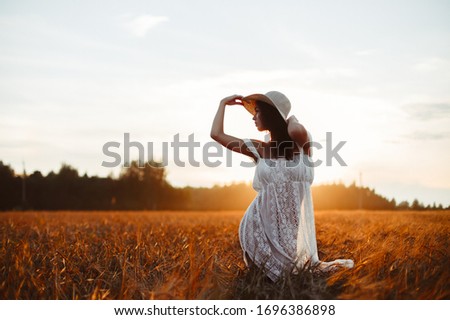 Similar – Image, Stock Photo Woman, both hands in the hair, back view