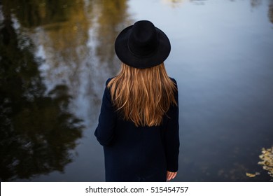 a girl with a hat