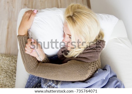 Similar – Baby sleeping on a blanket while her mother looks