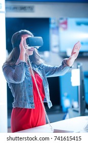 Girl Having Fun Trying New 360 Vr Headset At Tech Store