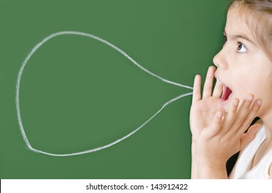 Girl having a message on chalkboard